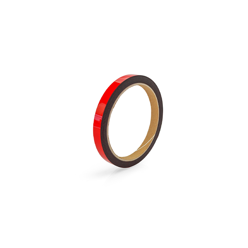 Glossy magnetic tape on a roll